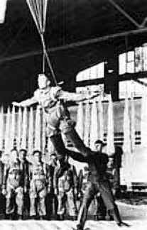 German parachute during suspended harness training, notice he has no control of his canopy